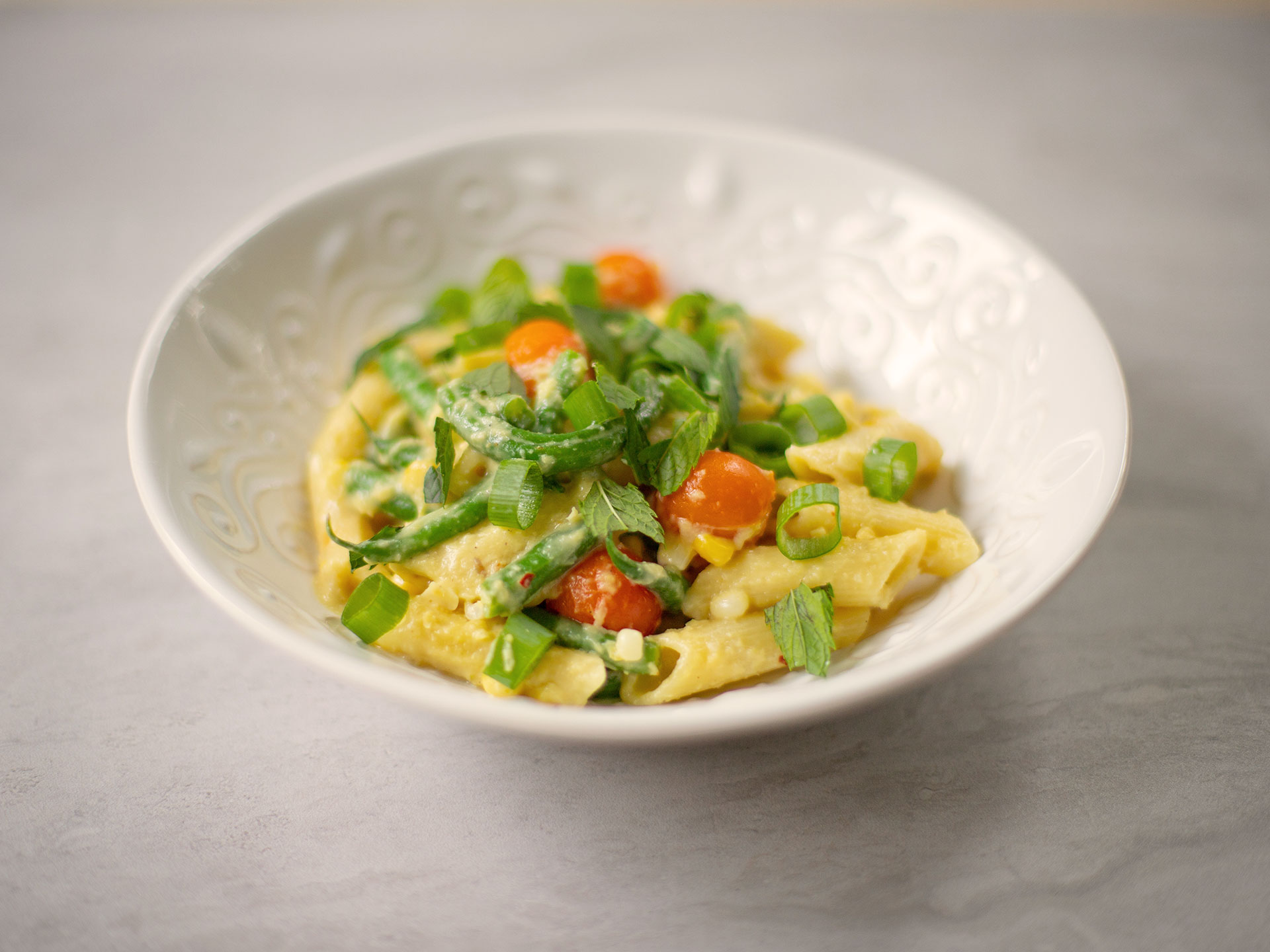 creamy corn cherry tomato green beans pasta fresh herbs recipe