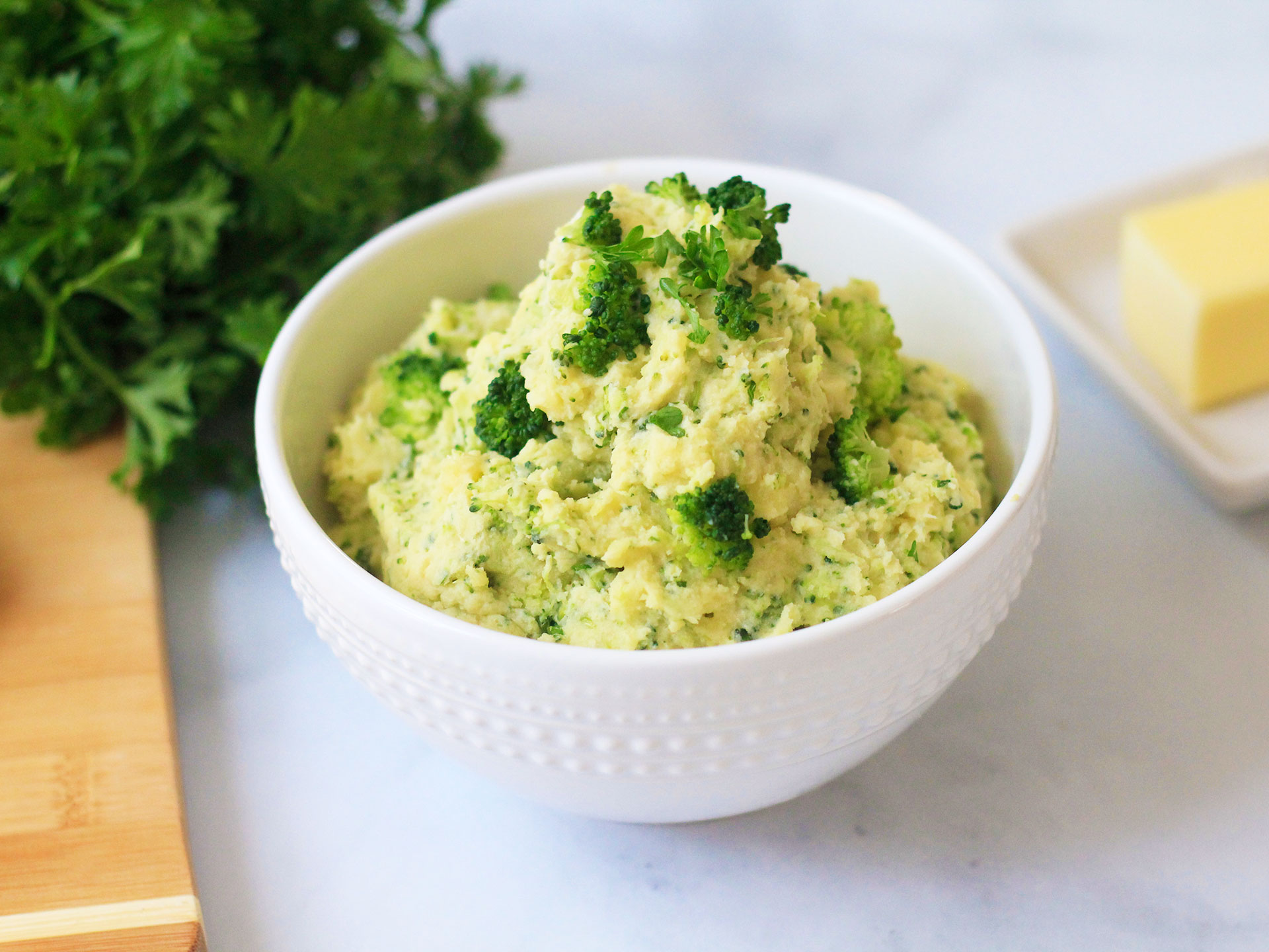 a bowl of Mashed Potatoes and Broccoli