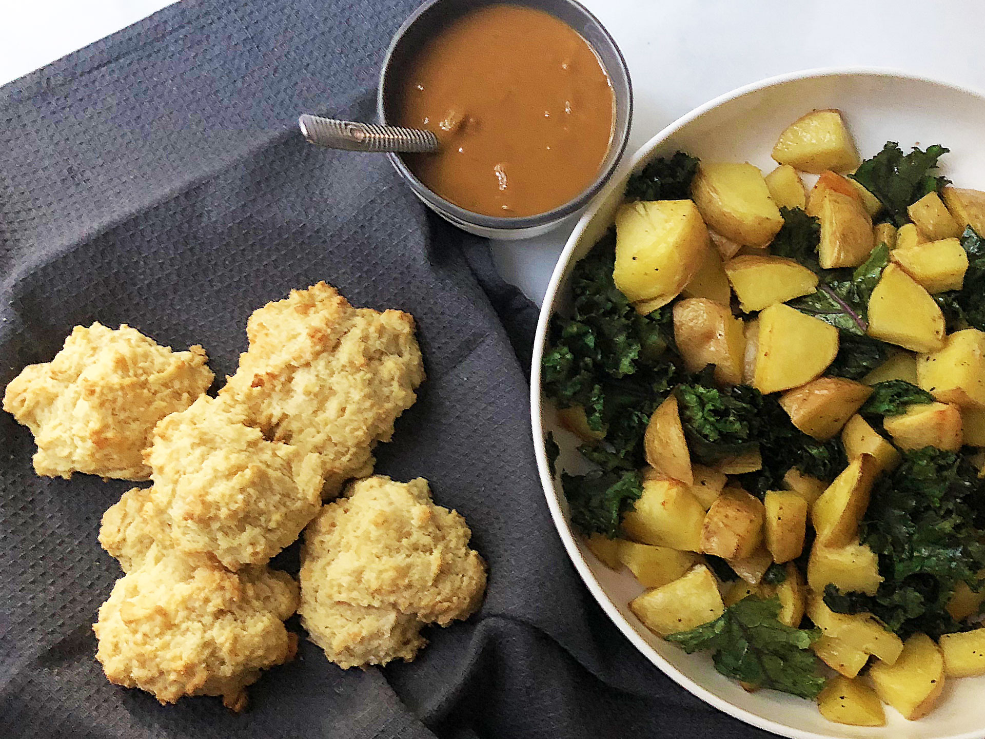 Roasted Potatoes with Kale, Gravy and Biscuits